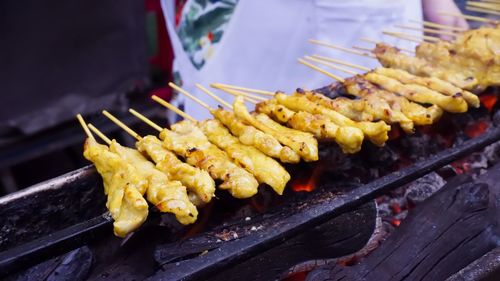 High angle view of meat on barbecue grill