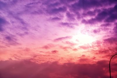 Low angle view of cloudy sky during sunset