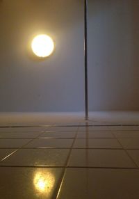 Illuminated lamp in dark room