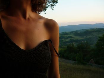 Woman standing on mountain