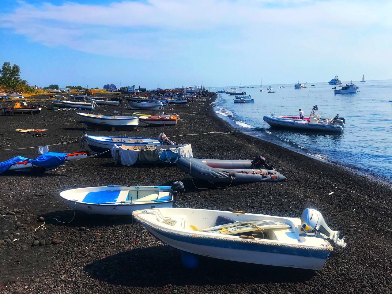 transportation, nautical vessel, mode of transportation, water, moored, sea, sky, nature, beach, day, cloud - sky, land, no people, outdoors, travel, sand, rowboat, inflatable