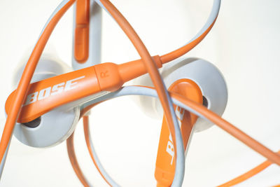 Close-up of earphones against white background