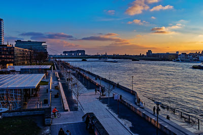 High angle view of bridge over river against sky during sunset