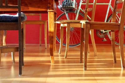 Close-up of chairs on hardwood floor