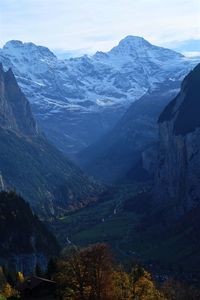 Scenic view of mountains against sky at night