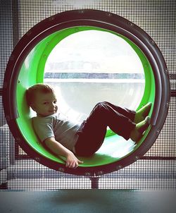 Boy playing in swimming pool