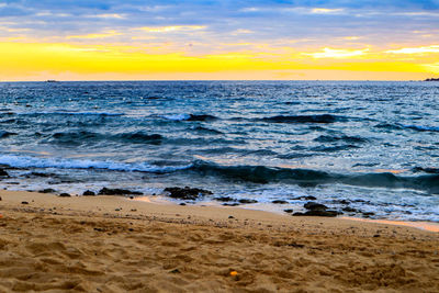 Scenic view of sea against sky during sunset