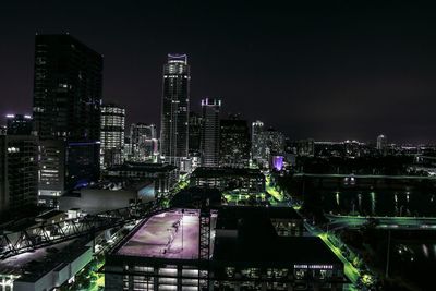 Illuminated cityscape at night