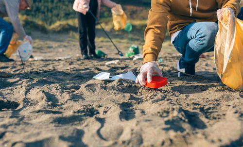 Low section of people on beach