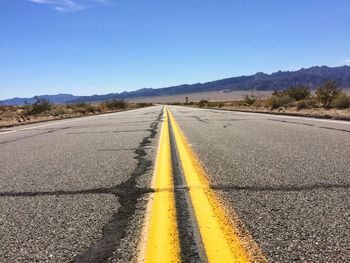 Surface level of road against sky