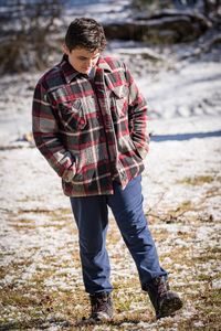 Full length of man standing in water