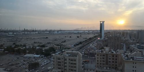 High angle view of buildings against sky during sunset