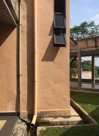 Staircase of building against sky on sunny day