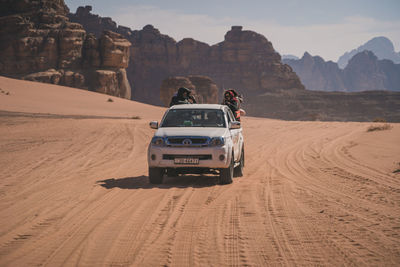 Car on desert land