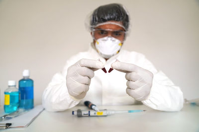 Portrait of man with arms outstretched