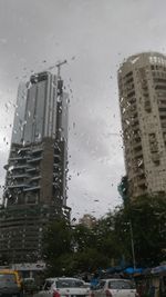 Raindrops on city street during rainy season