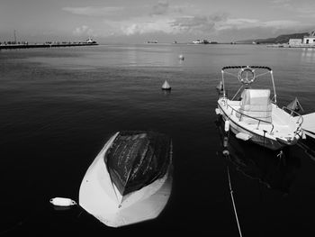 High angle view of sailboats moored in sea