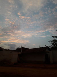 House against sky during sunset