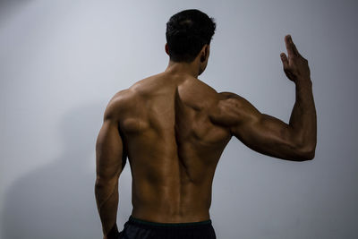 Close-up of shirtless muscular man