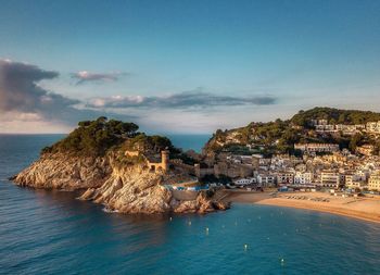 Scenic view of bay against clear sky