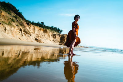 Side view of man on beach