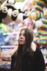 Portrait of young woman looking away