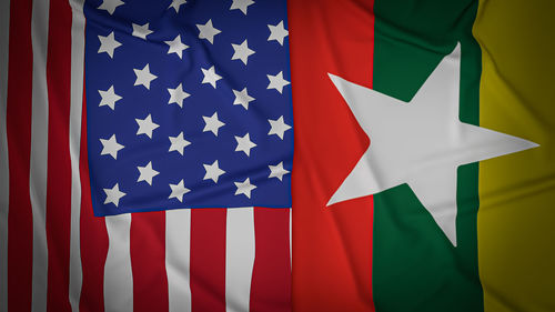 Close-up of flag against blue background