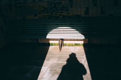 Shadow of people on road