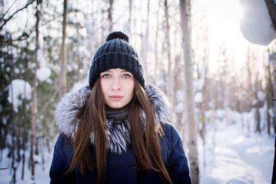 Portrait of beautiful woman in snow