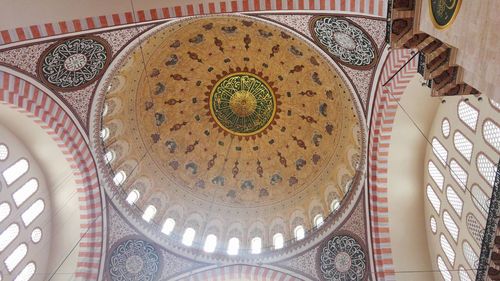 Low angle view of ornate ceiling in building