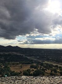 Scenic view of dramatic sky over landscape