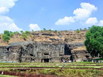 View of ellora caves against cloudy sky