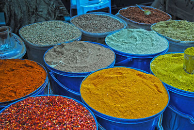 Colorful spices for sale at market stall