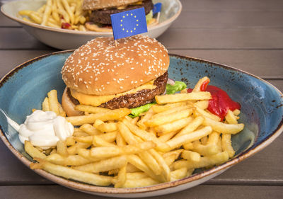 Close-up of burger in plate on table