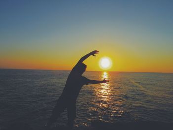 Scenic view of sea at sunset