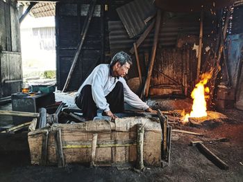 A high-spirited old blacksmith