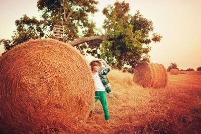 Full length of boy standing on land