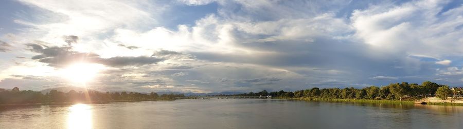 Panoramic view of lake against sky during sunset