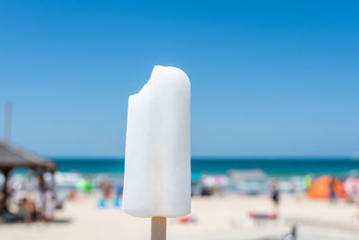 White popsicle on beach