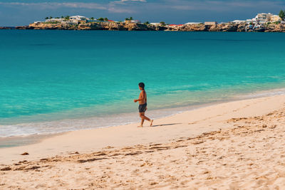 Full length of man on beach