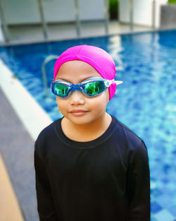 Portrait of boy in swimming pool