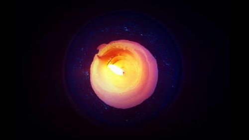 Close-up of illuminated light at night