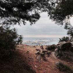 View of calm beach against sky