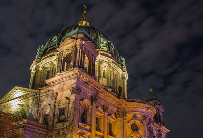 Low angle view of illuminated temple building against sky