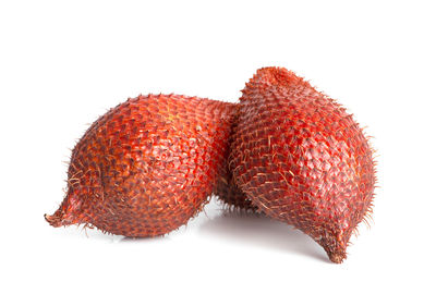 Close-up of strawberries on white background