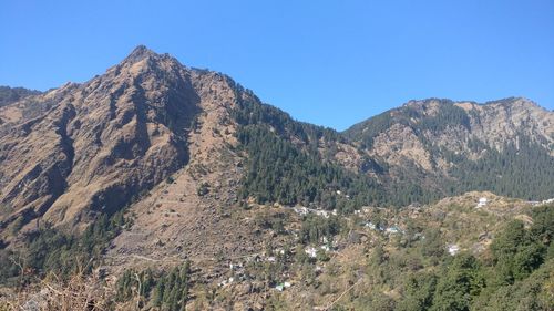 Scenic view of mountains against clear sky