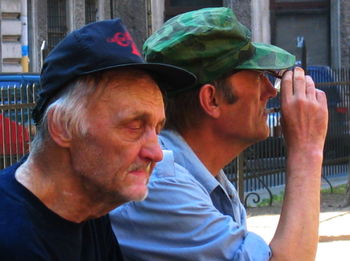 Midsection of man wearing hat