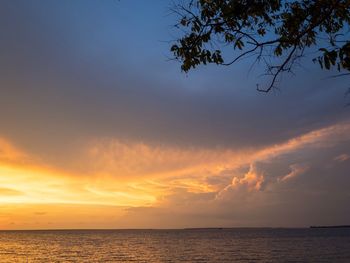 Scenic view of sea against sky at sunset