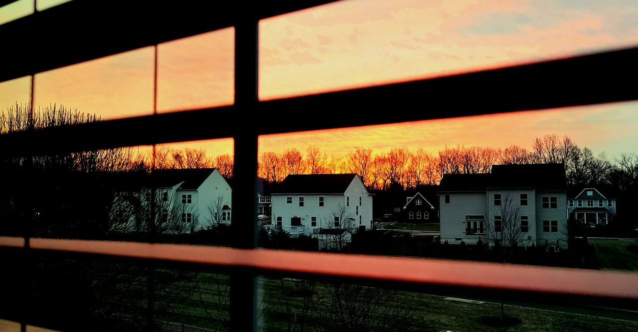 architecture, built structure, building exterior, sky, sunset, reflection, no people, window, nature, building, evening, tree, light, outdoors, cloud, city, plant, house, residential district, glass, dusk, silhouette, transportation