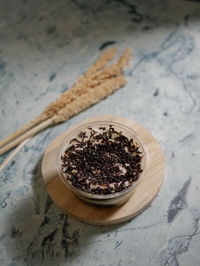 High angle view of black forest dessert cup on table